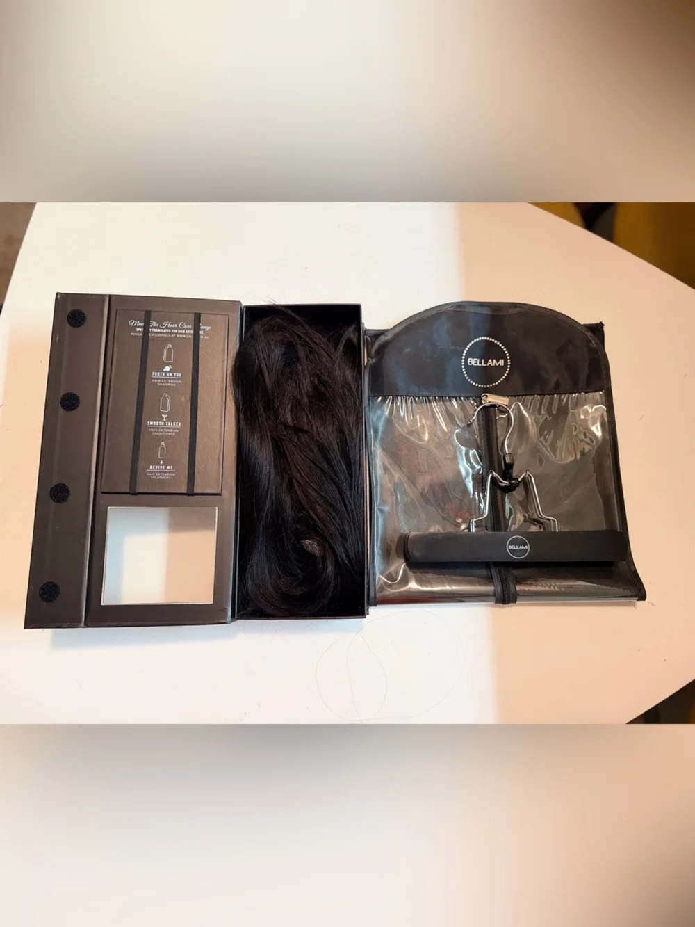 Premium Black Clip-In Human Hair Extensions - Sleek Natural Black